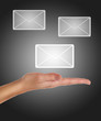 Foto: female hand holding or getting e-mail female hand holding or getting e-mail