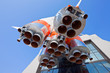 Details of space rocket engine over blue sky background Details of space rocket engine over blue sky background