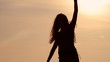 girl on the beach and evening sunset