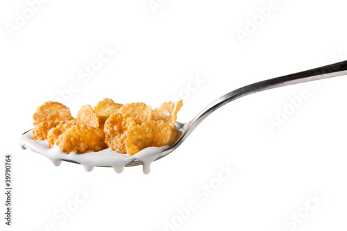 Photo: Tasty cornflakes in spoon Tasty cornflakes in spoon