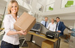 Girl with box at the office