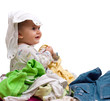 Photo: Baby in heap of wear Baby in heap of wear