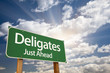 Deligates Green Road Sign and Clouds