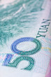 Cropped close-up of Chinese RMB banknotes with limited DOF Cropped close-up of Chinese RMB banknotes with limited DOF