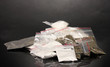 Cocaine and marihuana in packages on grey background