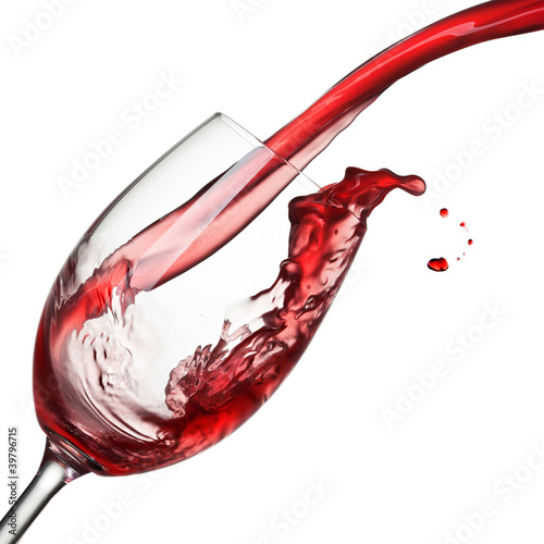 Photo: Splash of wine isolated on white Splash of wine isolated on white