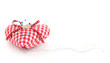 Colored pinheads in pin-cushion isolated on white