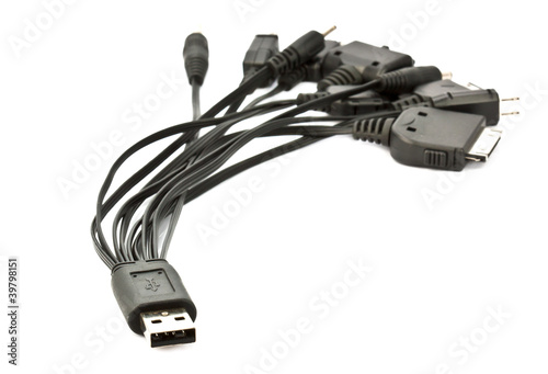Photo: cellphone usb charging plugs on the white background cellphone usb charging plugs on the white background