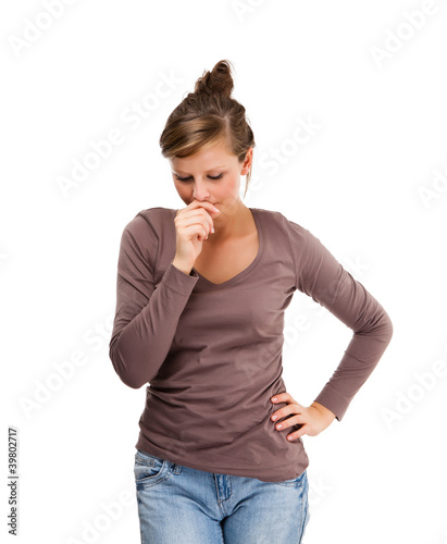 Photo: Depressed young attractive woman isolated on white Depressed young attractive woman isolated on white