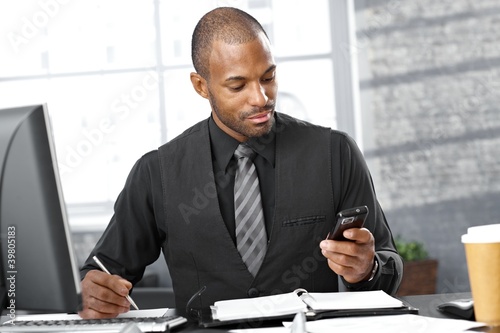 Photo: Smart businessman busy working Smart businessman busy working