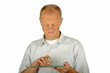 Astonished man looking at his tablet computer