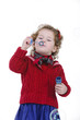 little girl with blond curly hair studio shoot