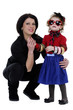young mother with her funny daughter studio shoot