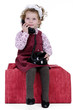 little girl with blond curly hair studio shoot