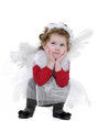 little girl with blond curly hair studio shoot