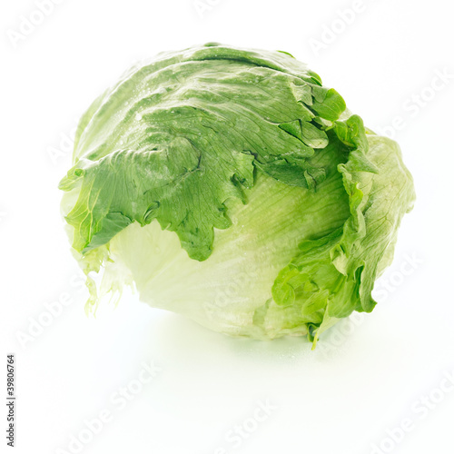 Photo: Fresh iceberg lettuce over white background Fresh iceberg lettuce over white background