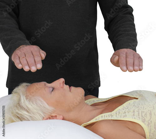 Photo: Male healer and female client Male healer and female client