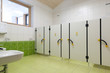 toilet with small doors for children with nice decorated tiles