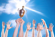 Hand of the person with a sports cup