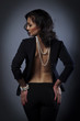 Photo: woman in profile, put her hands on her hips, seen from behind woman in profile, put her hands on her hips, seen from behind