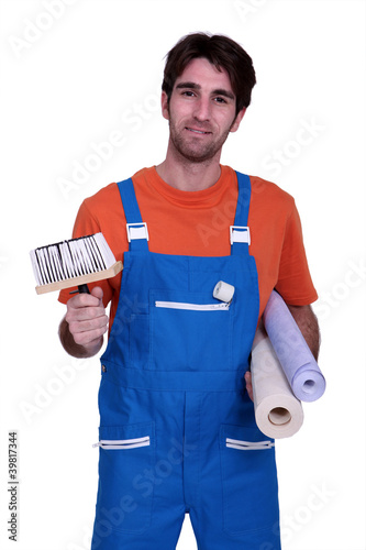 Photo: Man ready to wallpaper Man ready to wallpaper