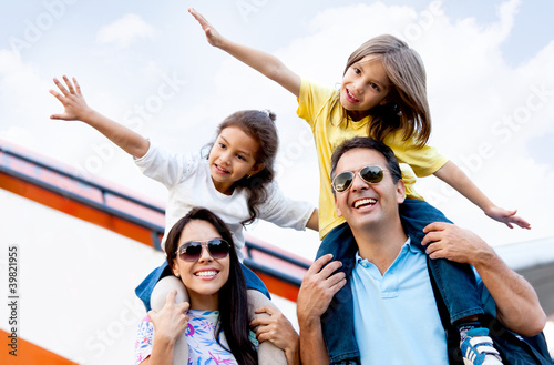 Photo: Family traveling by airplane Family traveling by airplane
