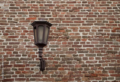 Photo: Lamp-post on brick wall in Belgrade fotress Lamp-post on brick wall in Belgrade fotress