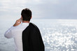 Businessman at the coast