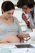 A pregnant woman at her gynaecologist.