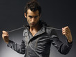 Photo: Closeup portrait of young seductive serious man with stubble Closeup portrait of young seductive serious man with stubble