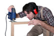 Carpenter making a frame