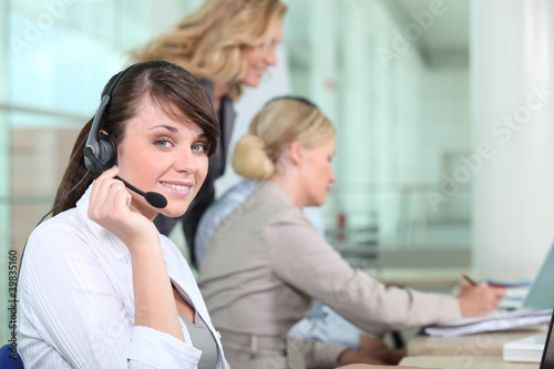 Photo: Women working in a call center Women working in a call center