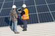 Men working on a photovoltaic plant Men working on a photovoltaic plant