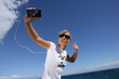 Woman jogging by the coast