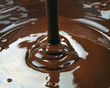 lots of chocolate falling from above lots of chocolate falling from above