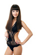 Sexy underwear model posing in a studio in a handmade swimsuit Sexy underwear model posing in a studio in a handmade swimsuit