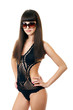 Sexy underwear model posing in a studio in a handmade swimsuit Sexy underwear model posing in a studio in a handmade swimsuit