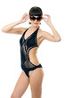 Sexy underwear model posing in a studio in a handmade swimsuit Sexy underwear model posing in a studio in a handmade swimsuit