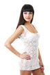 Sexy model posing in a studio in a handmade knitted dress Sexy model posing in a studio in a handmade knitted dress