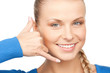 woman making a call me gesture