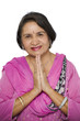 Indian woman traditional namaste greeting