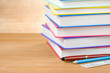 pile of books on wood pile of books on wood