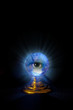 Glowing crystal ball with eye