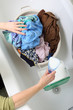Woman Pile of dirty laundry washing