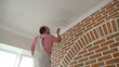 Video: Worker painting the ceiling Worker painting the ceiling