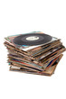Pile of old vinyl records isolated on white background