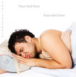 Man comfortably sleeping in his bed