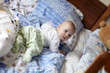Baby on parents's bed