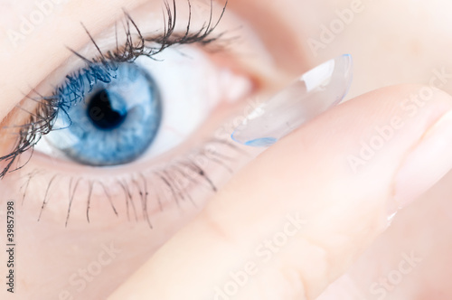 Photo: beautiful human eye and contact lens beautiful human eye and contact lens
