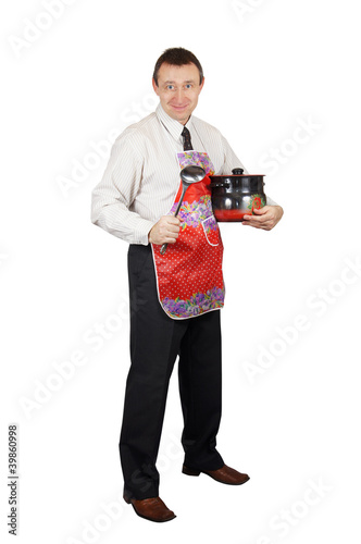 Photo: Smiling man with kitchen accessories Smiling man with kitchen accessories